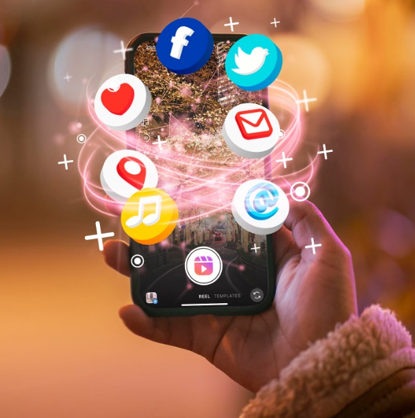 Hand holding smartphone with social media concept