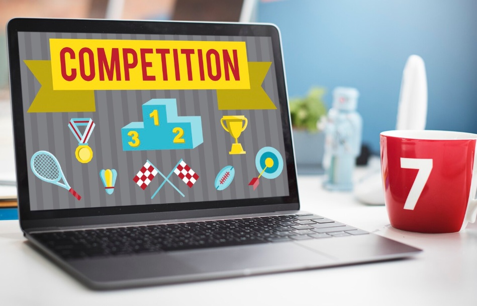 Laptop displaying the word competition