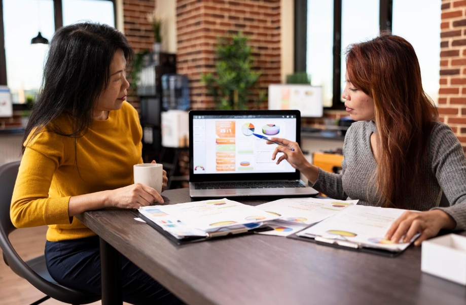 Two businesswomen working at the office