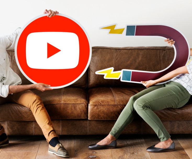 YouTube Ads 2 Couple holding a YouTube icon and a magnet