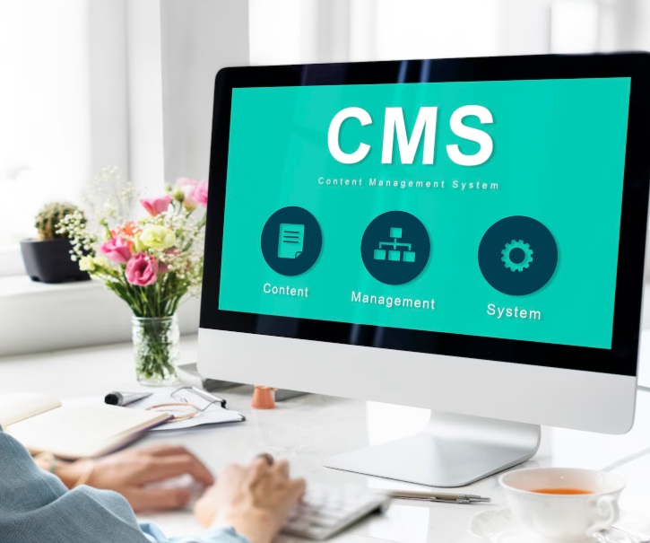 Desktop monitor showing a web CMS concept