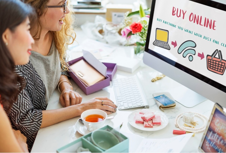 Two women navigating on an e-commerce website